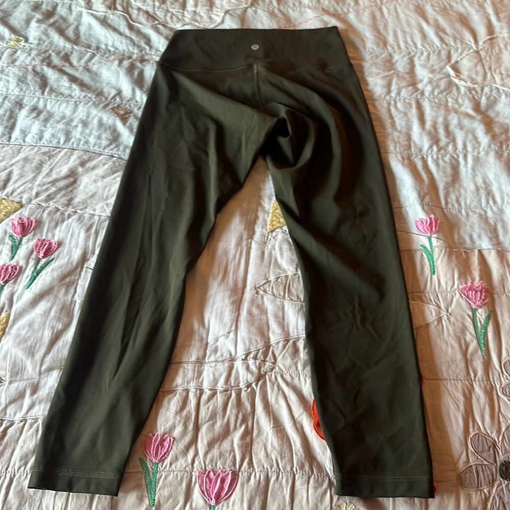 Lululemon hunter green leggings in size 8